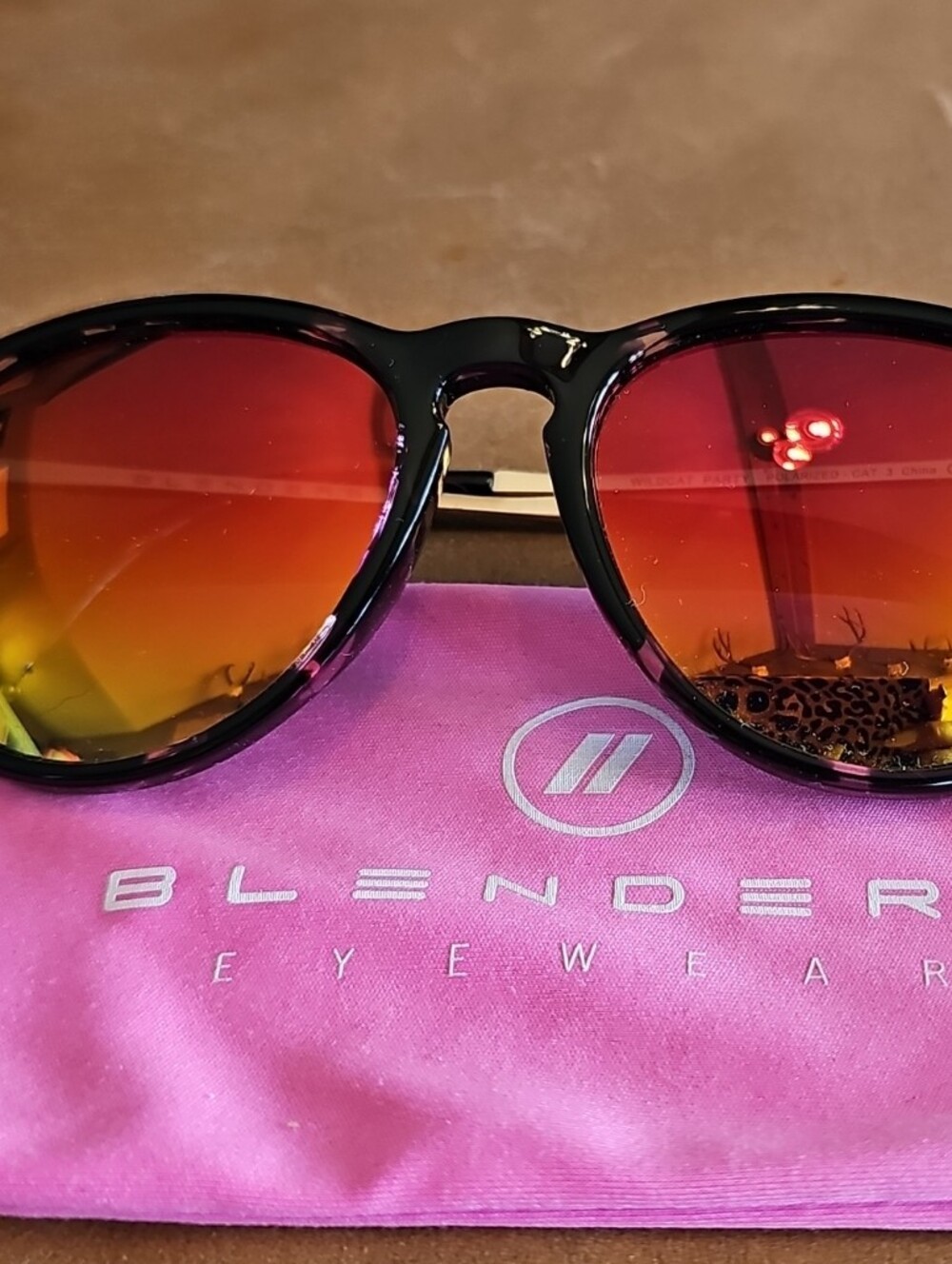 BlendErs Women's Black Frame Sunglasses with Red-Orange Mirrored Lenses
